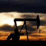 Brent oil rises on weaker dollar though IEA cuts demand outlook