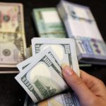 Dollar on course for worst month in decade as U.S. recovery loses steam